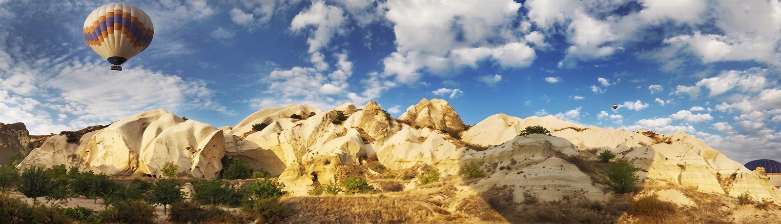 Hot-air balloon above Cappadocia’s sculpted rock valleys
